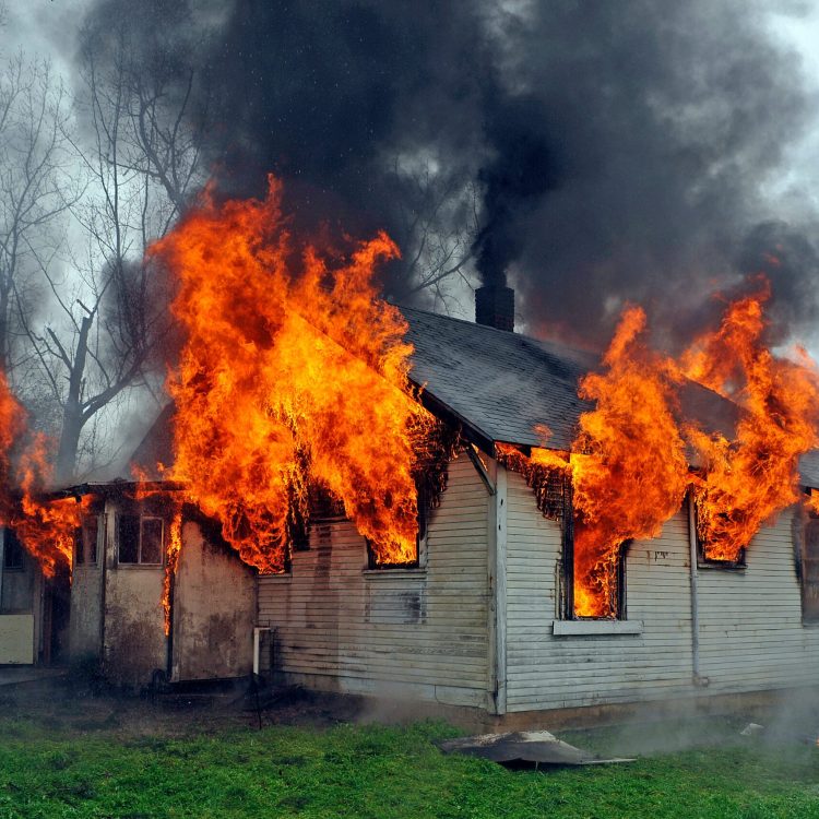 house on fire, flames out windows, smoke